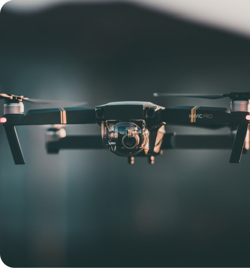 A drone hovering in the sky.